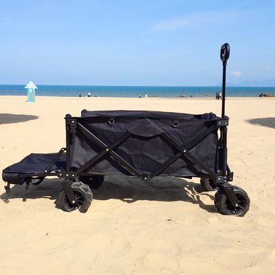 O vagão largo da dobradura da roda aceita o carro de dobramento de quatro vias personalizado da praia