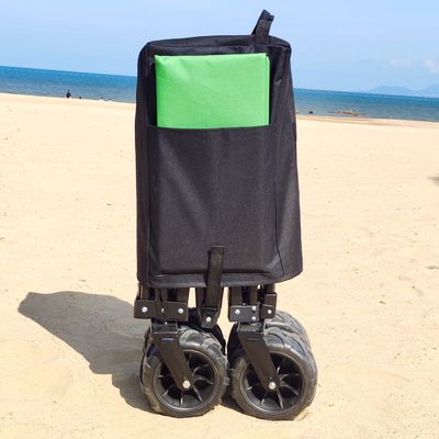 O vagão largo da dobradura da roda aceita o carro de dobramento de quatro vias personalizado da praia