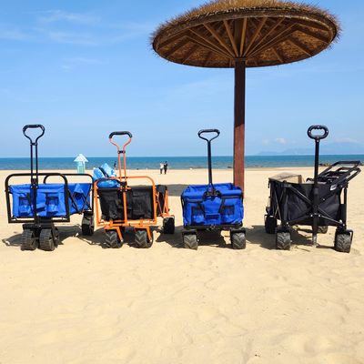 O vagão largo da dobradura da roda aceita o carro de dobramento de quatro vias personalizado da praia
